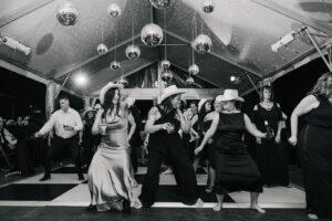 Wedding guests dancing on The Rooftop Observatory