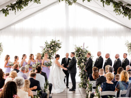 Carissa and Jarrod at the Altar during their Ceremony on the Rooftop {{brizy_dc_image_alt imageSrc=