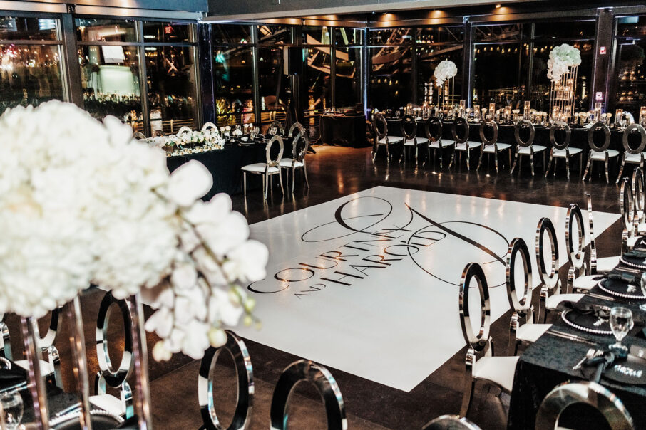 Custom wedding reception dancefloor with the bride and groom's names at The Bridge Building, downtown Nashville wedding venue