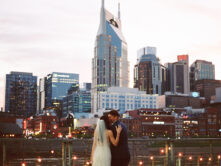 Sarah + Matias | Intimate Wedding Couple kissing in front of the Nashville skyline